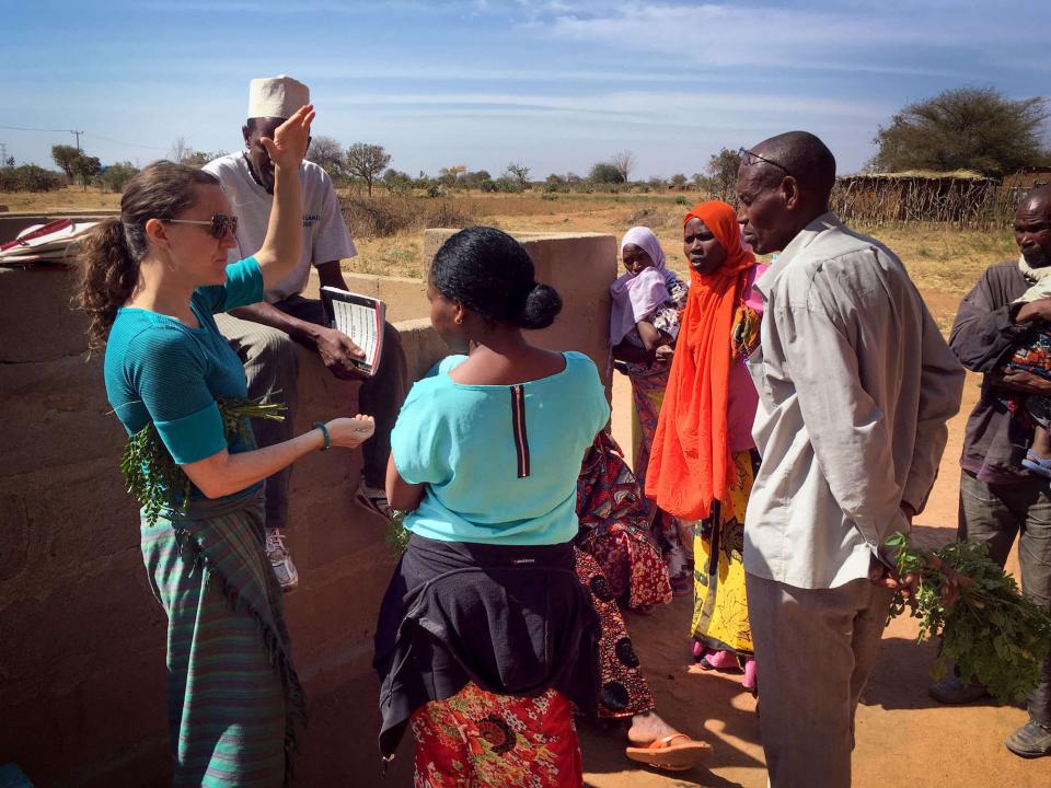 Carrie Waterman talking with local communities in Singida, Tanzania that are part of an ongoing 5-year participatory project on argroecology, climate change, nutrition, and social equity. They discussed the nutritional and health benefits of moringa. (Photo courtesy of Carrie Waterman)