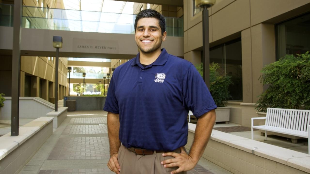 Albert Aguilera infront of Meyer hall