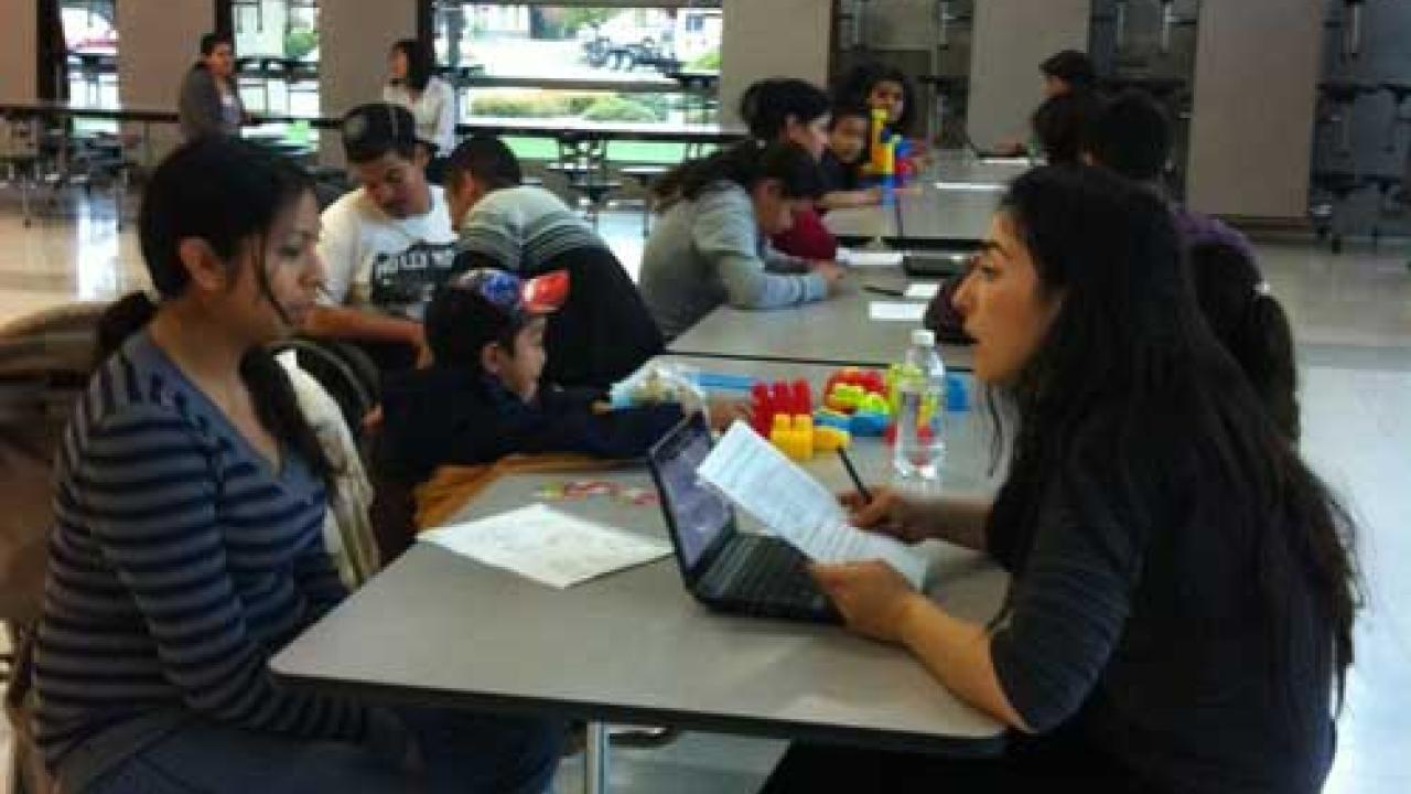People talking to each other at a table