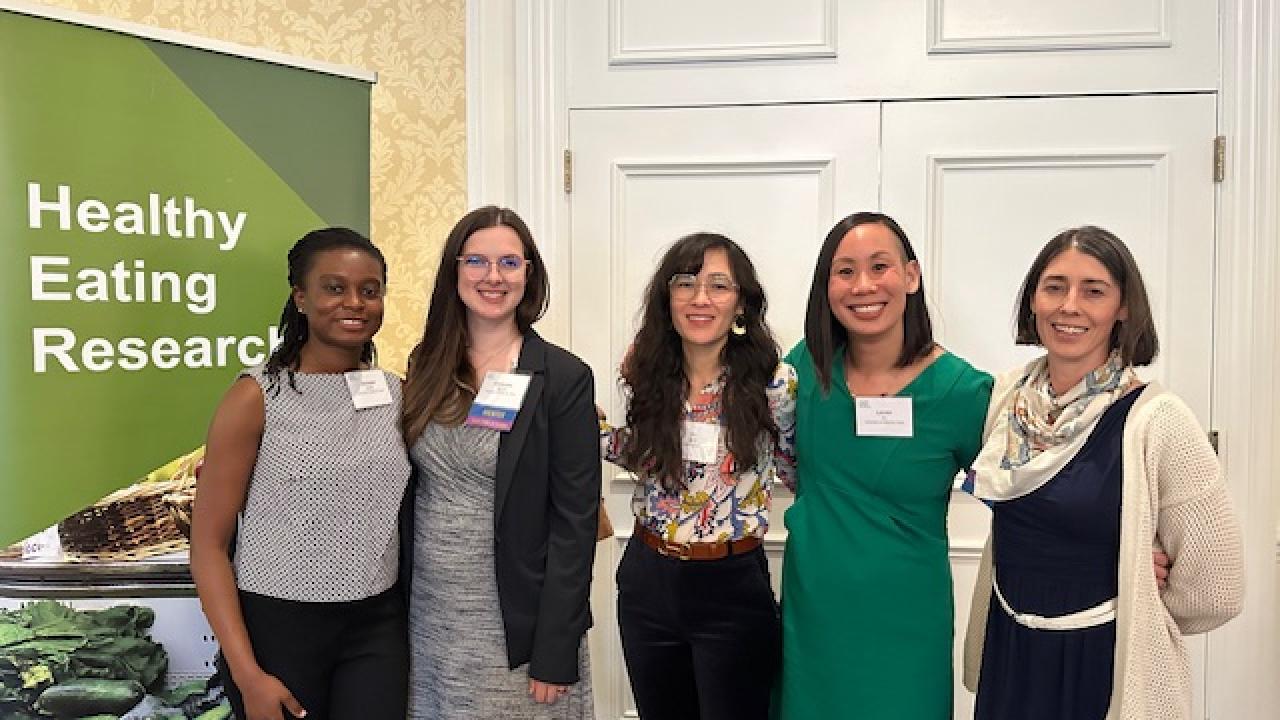 Group photo of Drs. Lauren Au, Drs. Cassandra Nguyen, and grad students