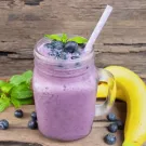 Photo shows banana and blueberry smoothie. (Getty)